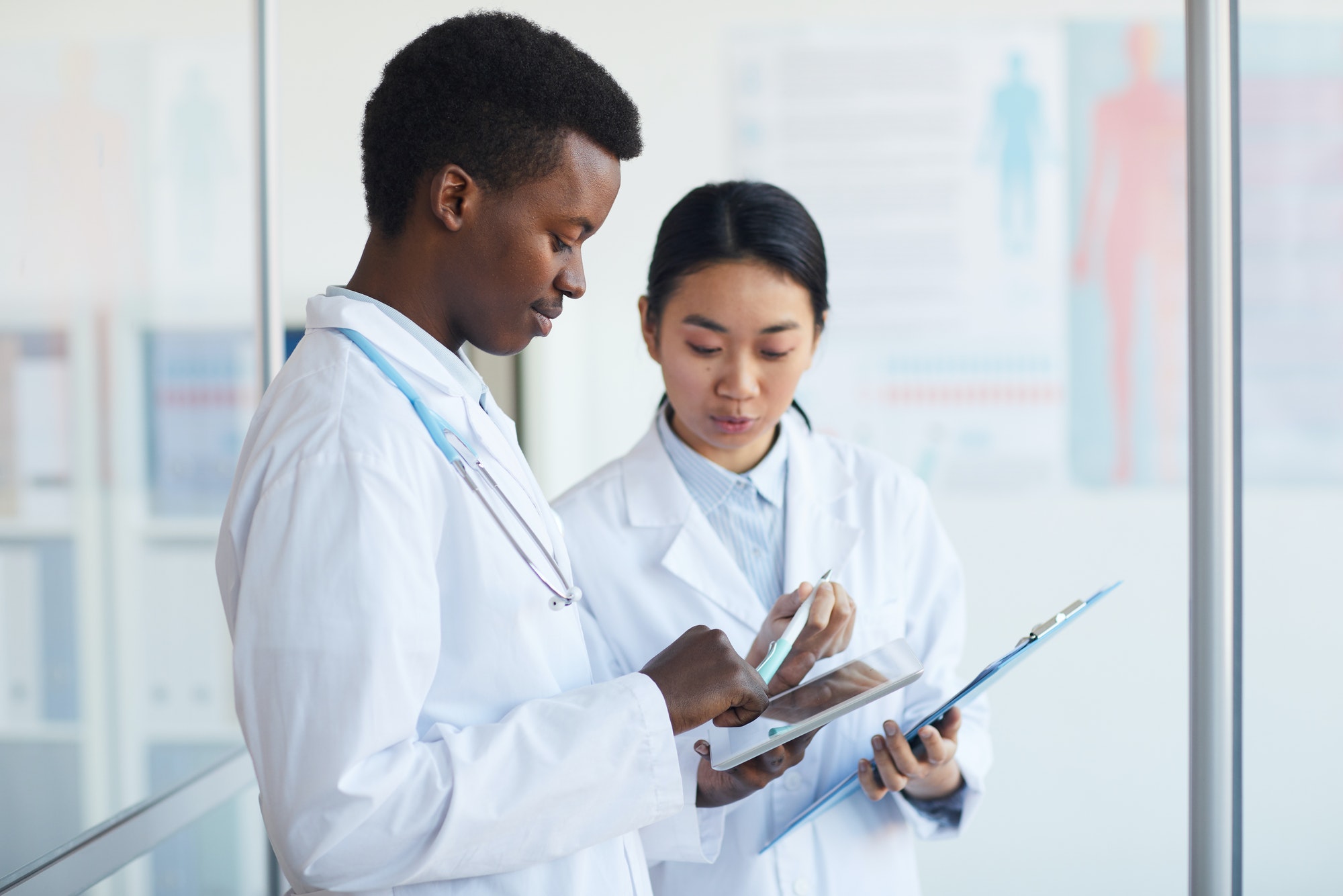 Two Young Doctors in Clinic